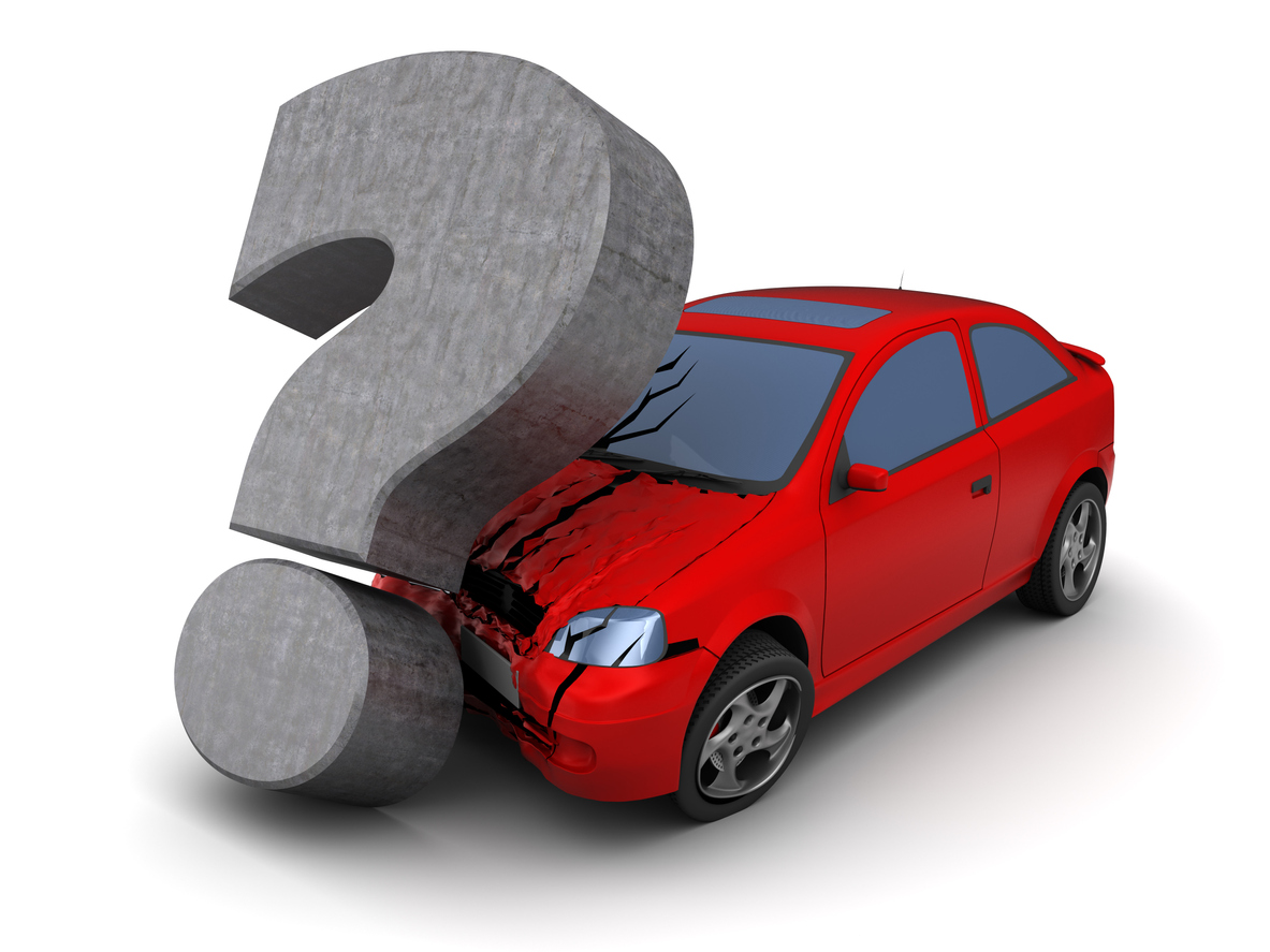 large grey question mark denting a red car