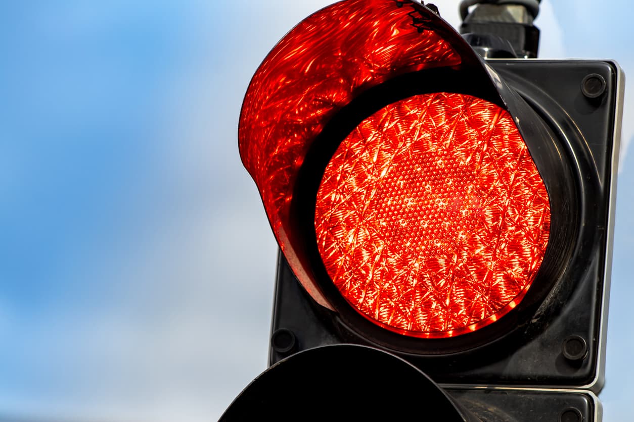Close-up of red traffic stoplight