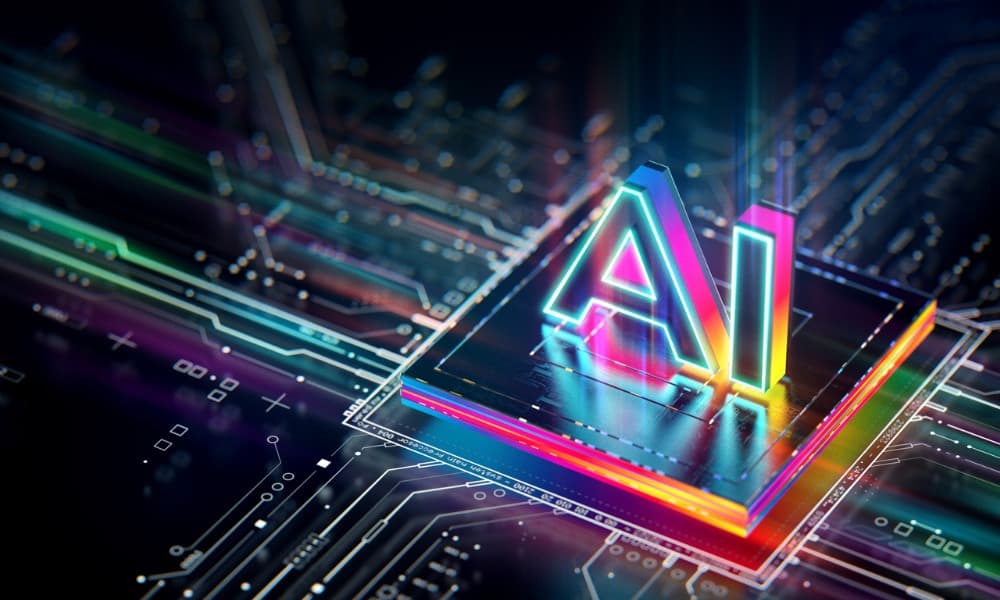 A colorful picture of a computer chip labeled “AI.”